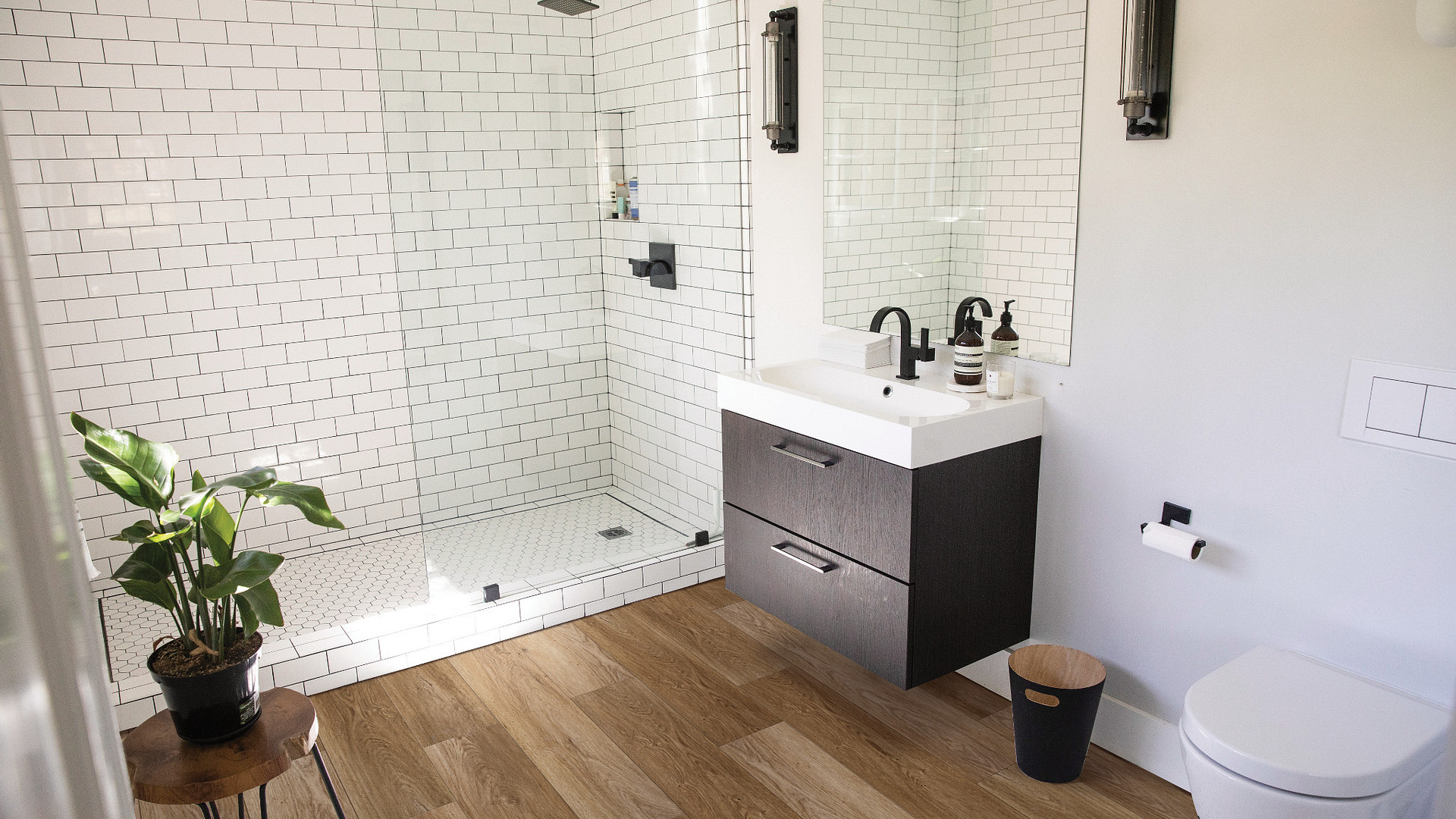 Luxury Vinyl Plank from Yoder Floors as a wood look flooring option for a master bathroom that will hold up to water and humidity.